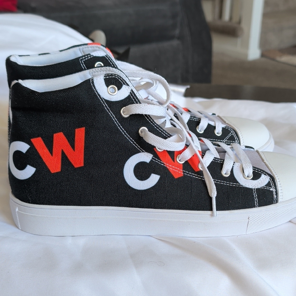 Converse Black Canvas High-Top Sneakers with Red and White Accents